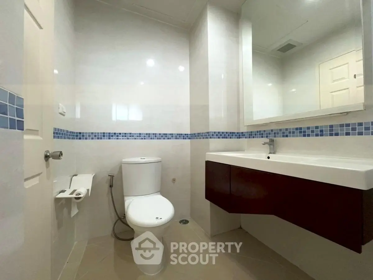 Modern bathroom with sleek fixtures and stylish tile accents