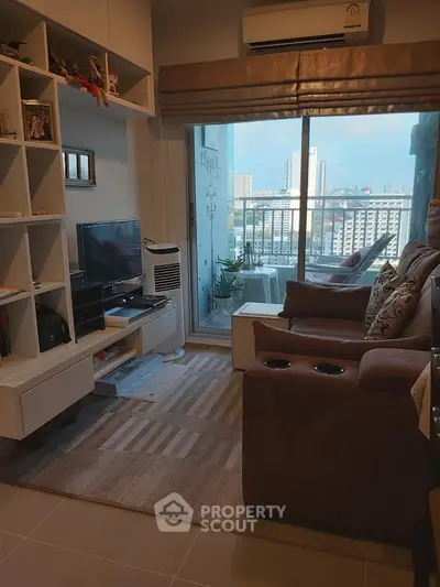 Cozy living room with balcony view in modern apartment