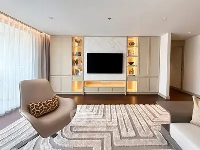 Luxurious modern living room with elegant decor and built-in shelving