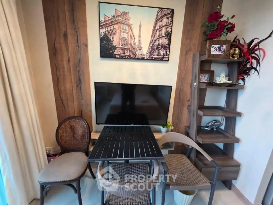 Charming living room with stylish decor and cozy seating area, perfect for relaxation and entertainment.