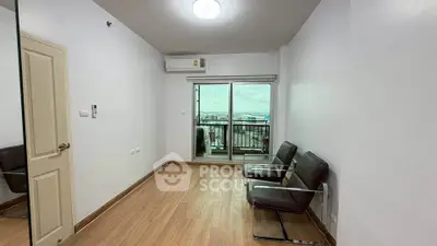 Spacious living room with balcony and city view in modern apartment