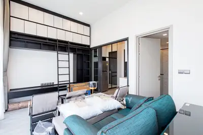 Modern living room with loft storage and stylish furniture in a contemporary apartment