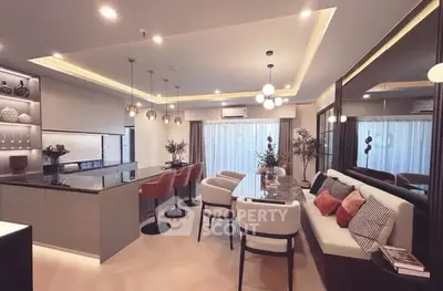 Luxurious modern kitchen and dining area with elegant lighting and stylish decor