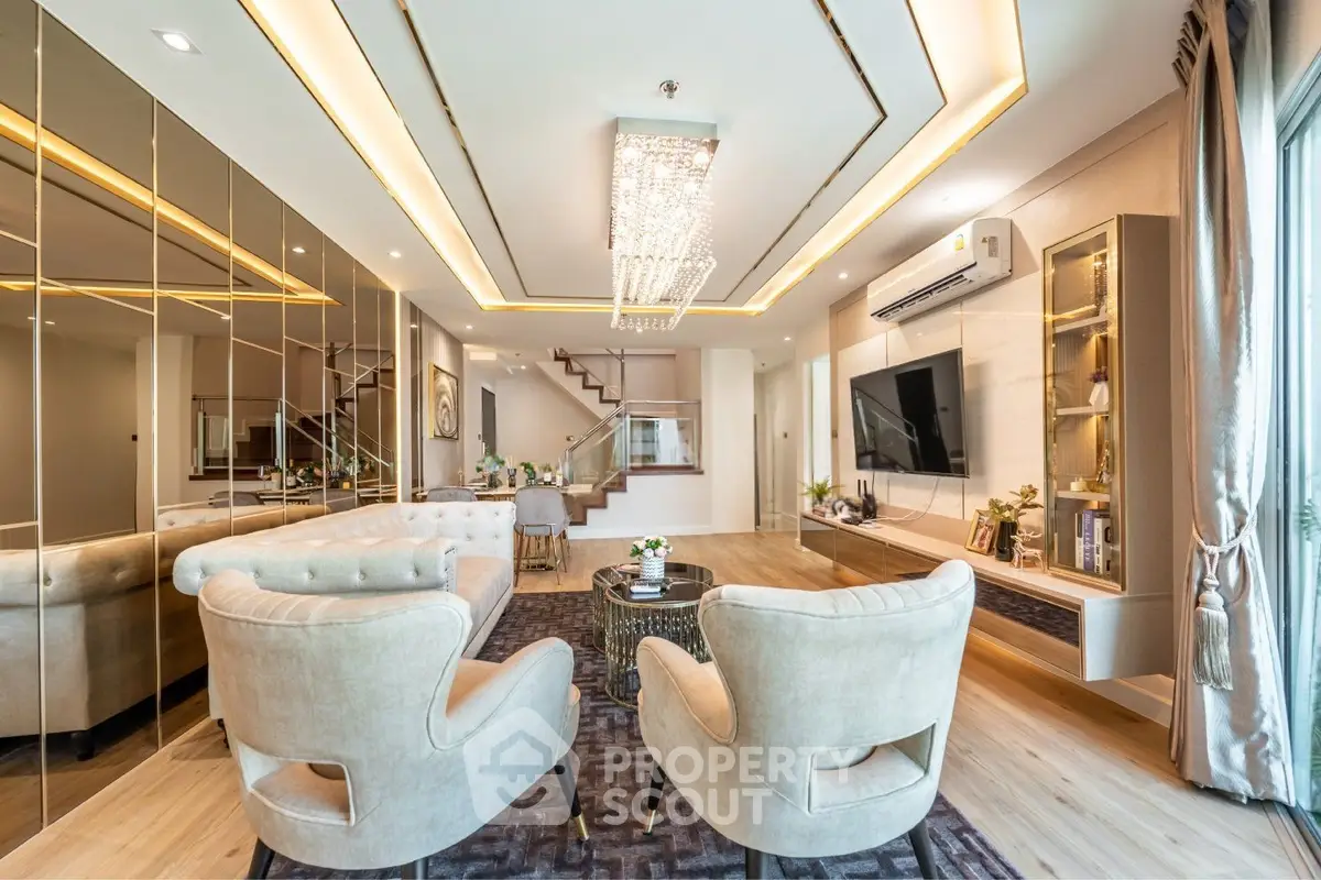 Luxurious modern living room with elegant decor and ambient lighting