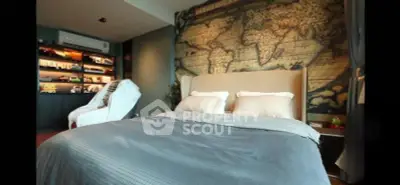 Luxurious bedroom with world map mural and modern decor