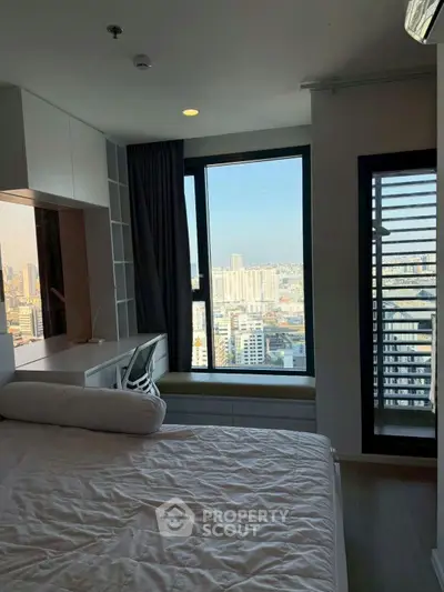Modern bedroom with city view and stylish decor