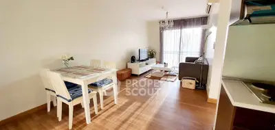 Spacious living room with dining area and modern decor