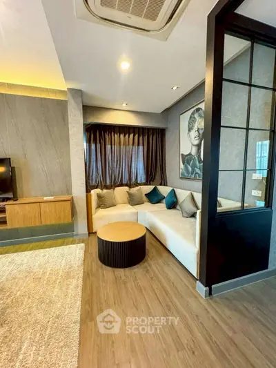 Stylish modern living room with cozy corner sofa and elegant decor