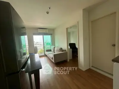 Modern living room with city view and sleek furniture