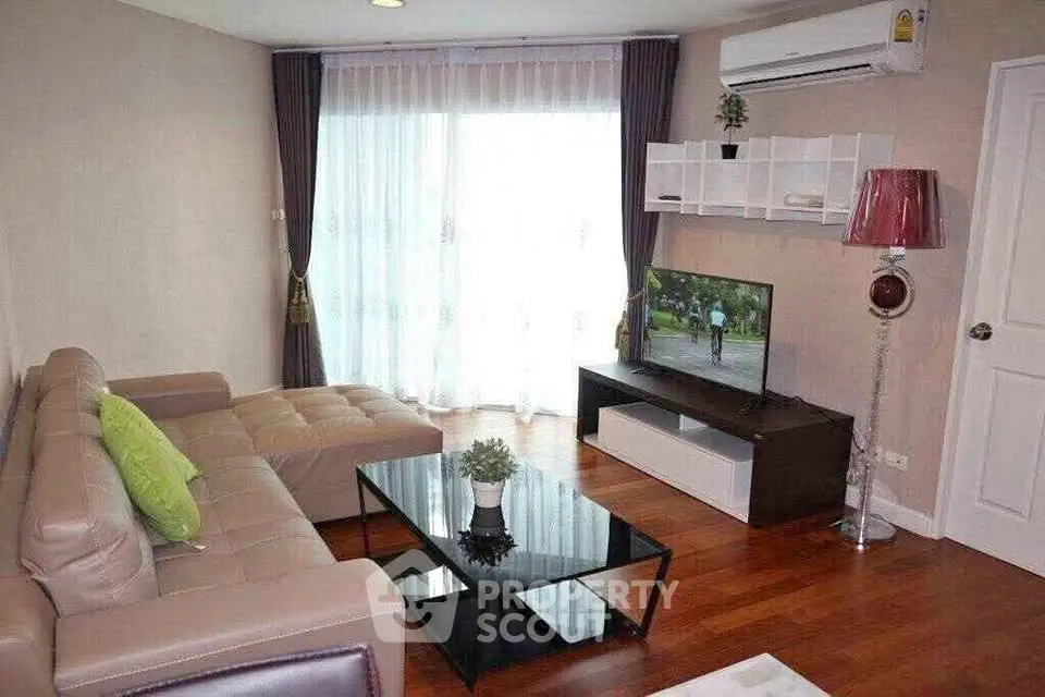 Modern living room with stylish furniture and natural light
