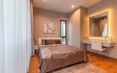 Luxurious bedroom with elegant decor and ambient lighting, featuring a cozy bed and stylish vanity area.