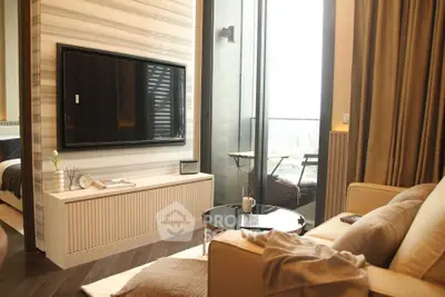 Cozy living room with modern decor and balcony view