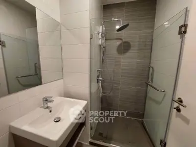 Modern bathroom with sleek shower and elegant sink design