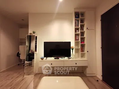 Modern living room with sleek TV unit and stylish decor
