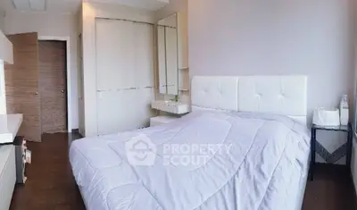 Modern bedroom with stylish decor and cozy ambiance