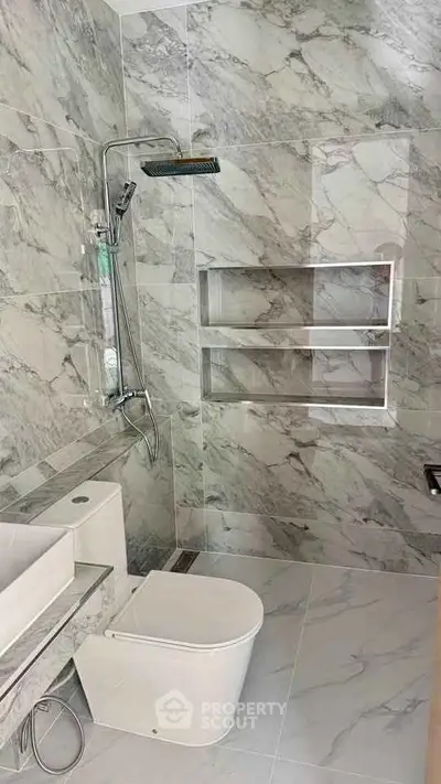 Luxurious marble bathroom with modern fixtures and elegant design