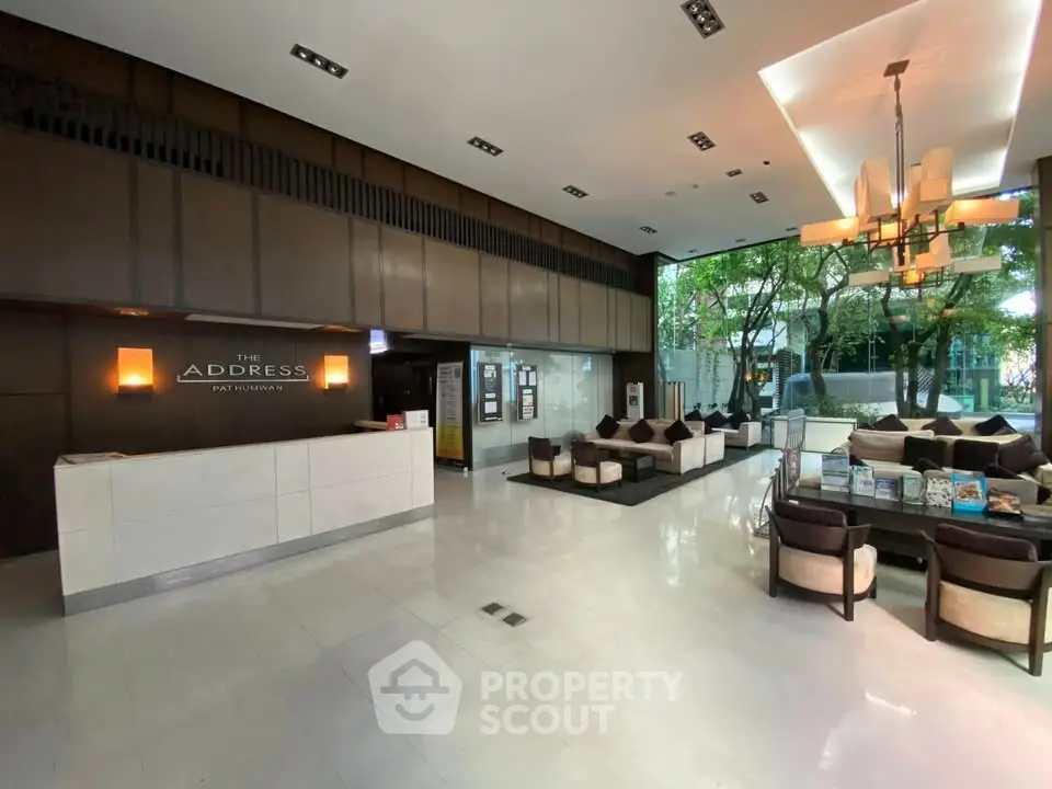Luxurious lobby with modern seating and elegant lighting at The Address Pattaya.