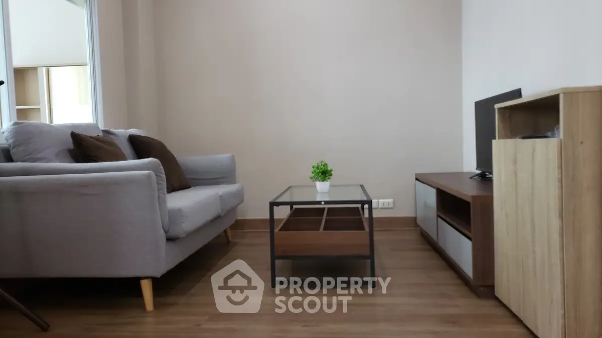 Cozy living room with modern furniture and wooden flooring