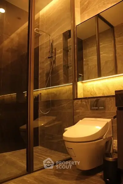 Luxurious modern bathroom with sleek design and ambient lighting