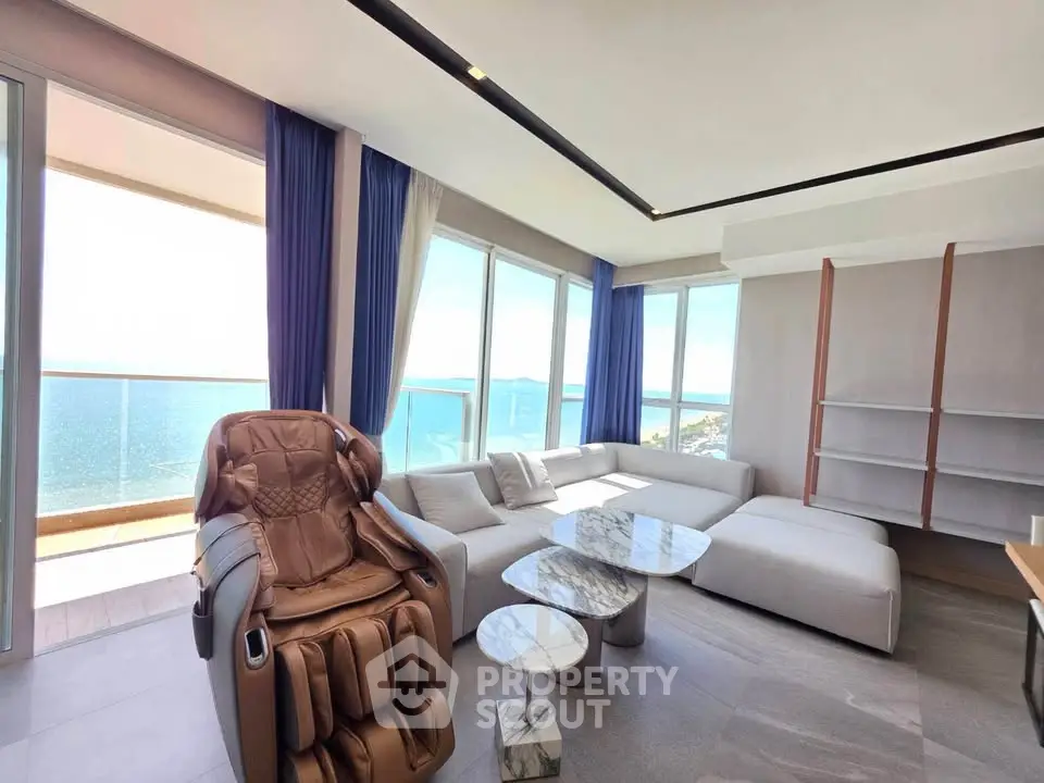 Luxurious living room with panoramic ocean view and modern furniture