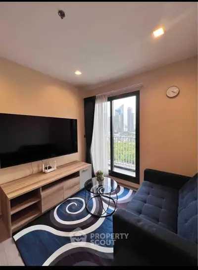 Modern living room with city view, stylish furniture, and large TV, perfect for urban living.