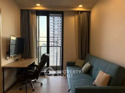 Modern living room with balcony view in high-rise apartment