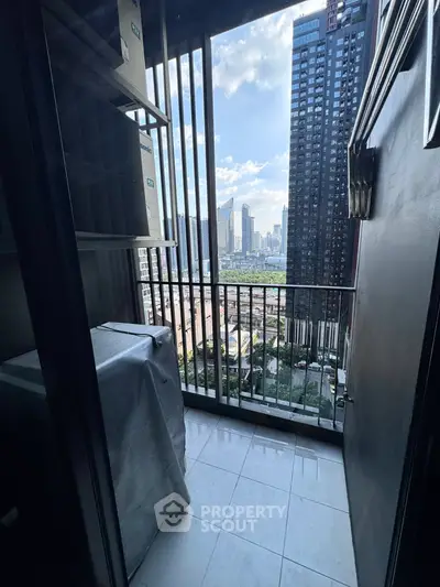 Compact balcony with city view, ideal for urban living, featuring sleek design and modern architecture.