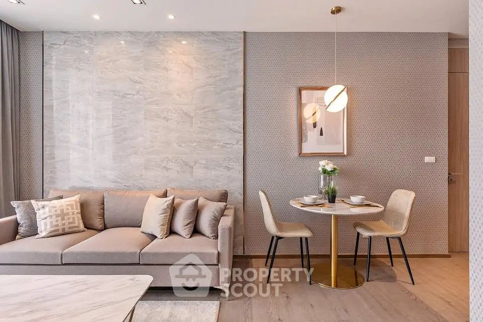 Elegant living room with modern decor and cozy dining area, perfect for stylish urban living.