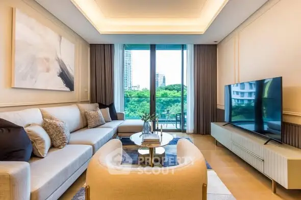 Luxurious living room with modern decor and large windows offering a stunning view of the cityscape.