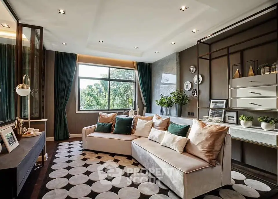Luxurious living room with modern decor and large window offering lush garden view.