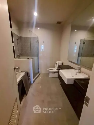 Modern bathroom with sleek fixtures and spacious layout