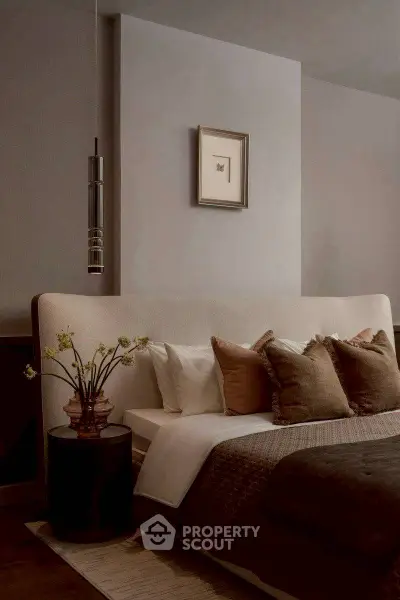 Luxurious bedroom with elegant decor and plush bedding, perfect for relaxation and comfort.