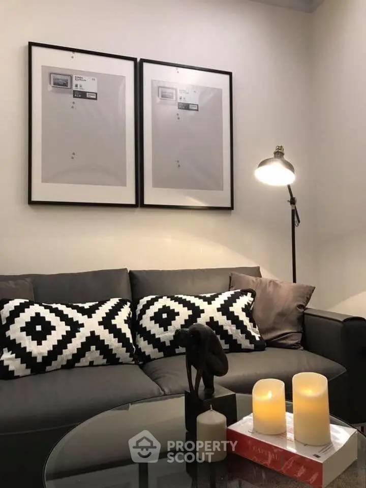Stylish living room with modern decor, cozy sofa, and ambient lighting for a warm atmosphere.