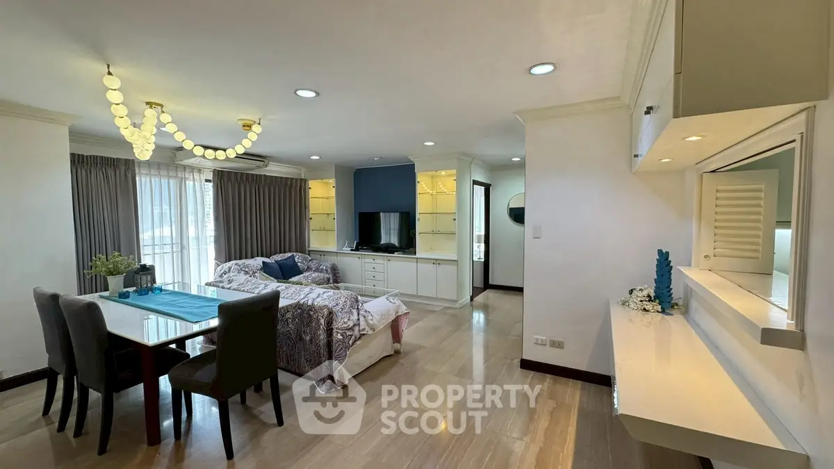 Spacious living room with elegant dining area and modern decor