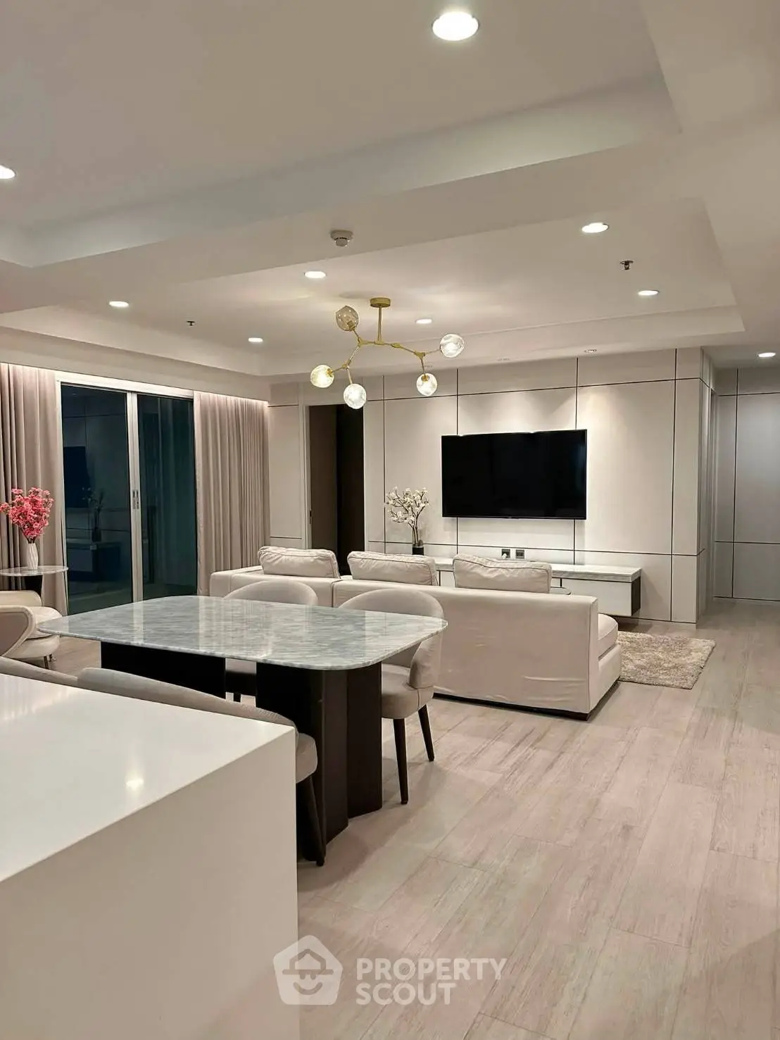 Luxurious modern living room with elegant decor and open layout, perfect for entertaining.