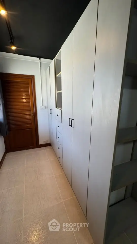 Spacious storage room with modern cabinetry and sleek design