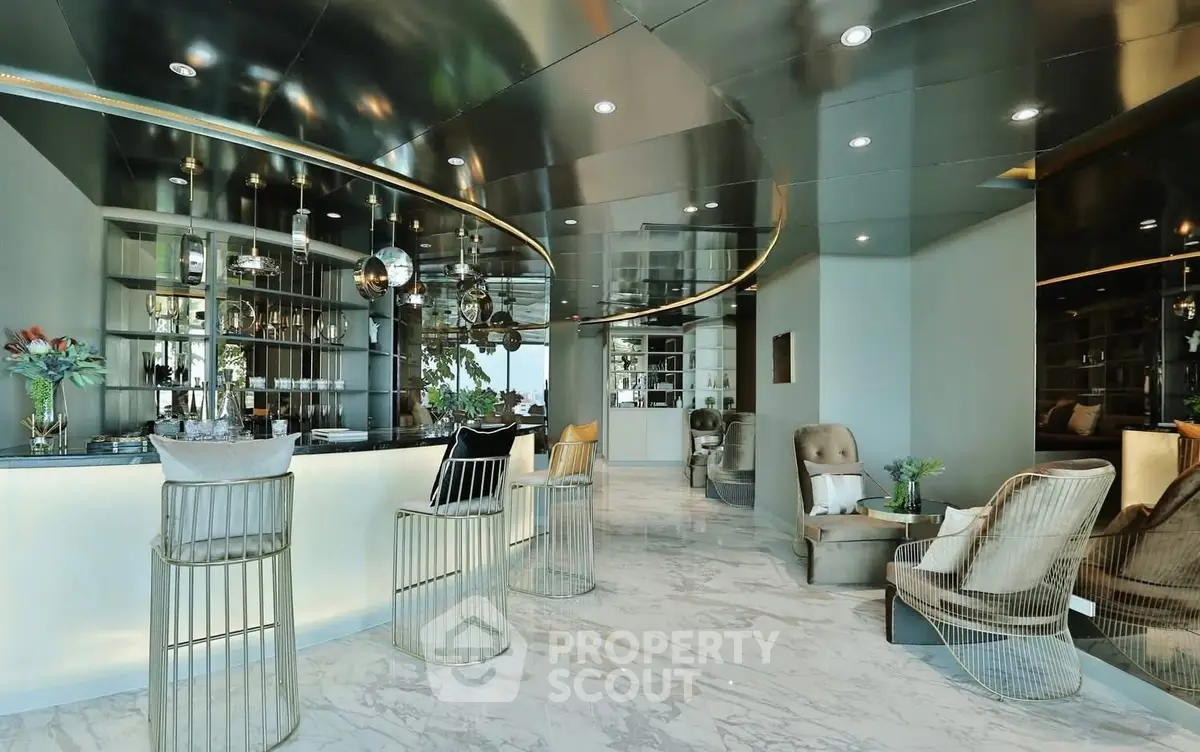 Luxurious modern living room with sleek bar and elegant seating