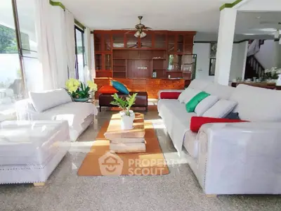 Spacious living room with elegant furniture and natural light