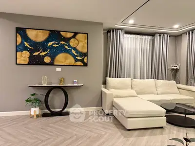 Elegant living room with modern decor and cozy sectional sofa