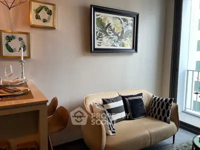 Stylish living room with modern decor and cozy seating near a small balcony.