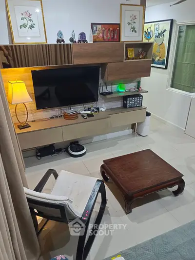 Cozy living room with modern TV setup and stylish decor