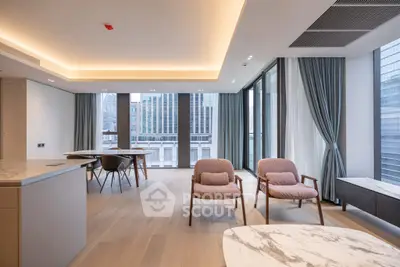 Modern living room with city view, elegant furniture, and natural light