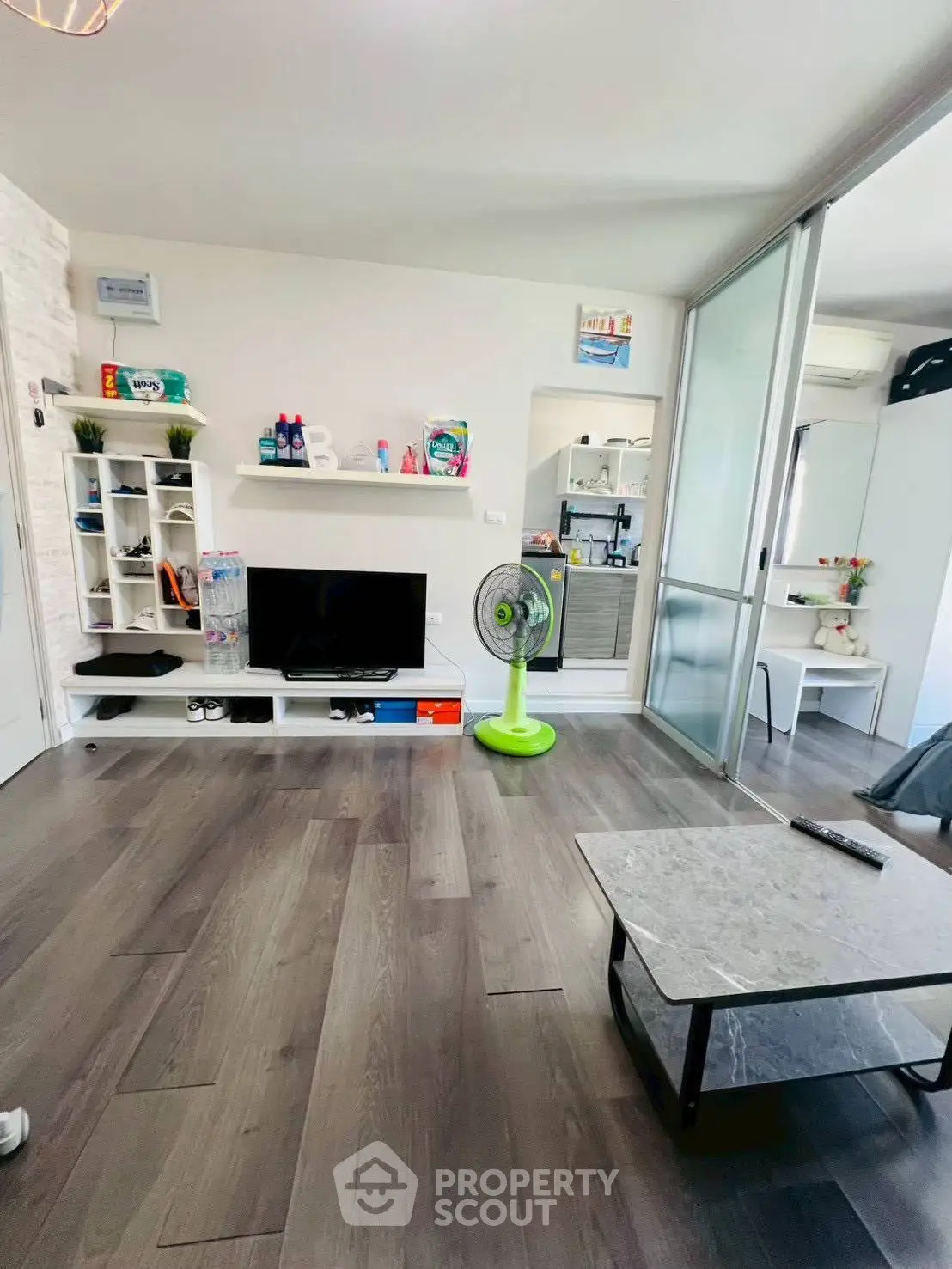 Modern living room with sleek flooring and stylish decor