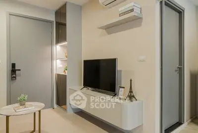 Modern living room with sleek TV unit and stylish decor