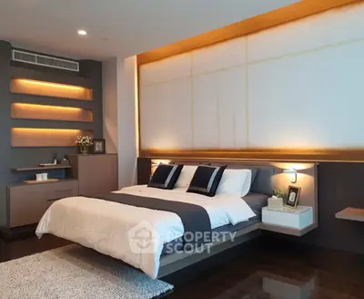 Luxurious modern bedroom with ambient lighting and elegant decor