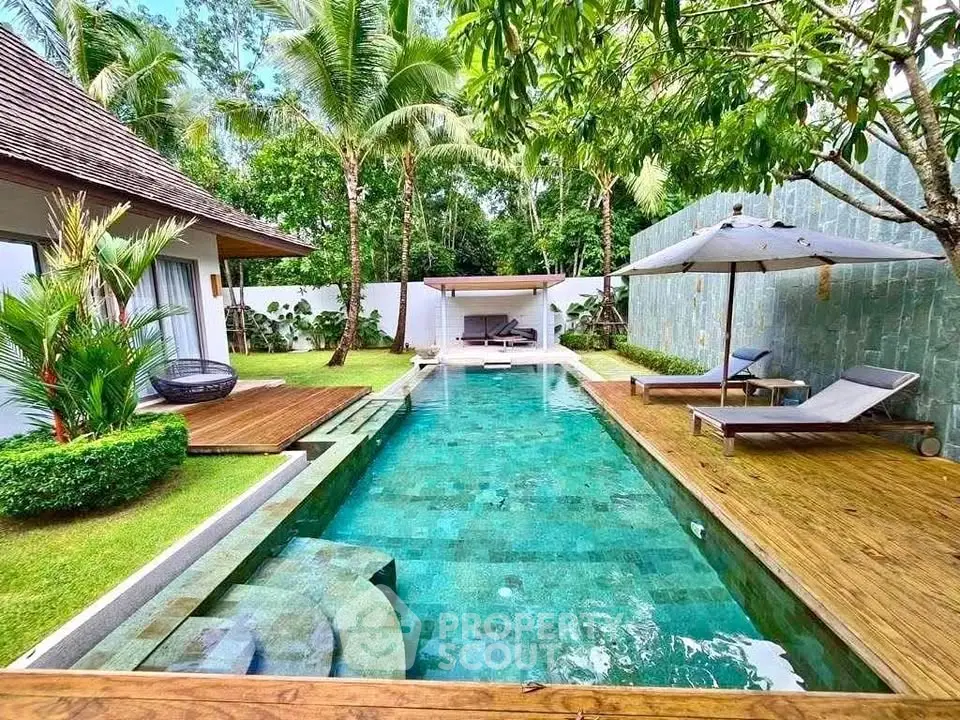 Luxurious tropical villa with private pool and lush garden oasis.