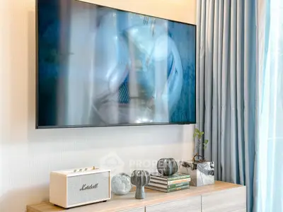 Modern living room with wall-mounted TV and stylish decor