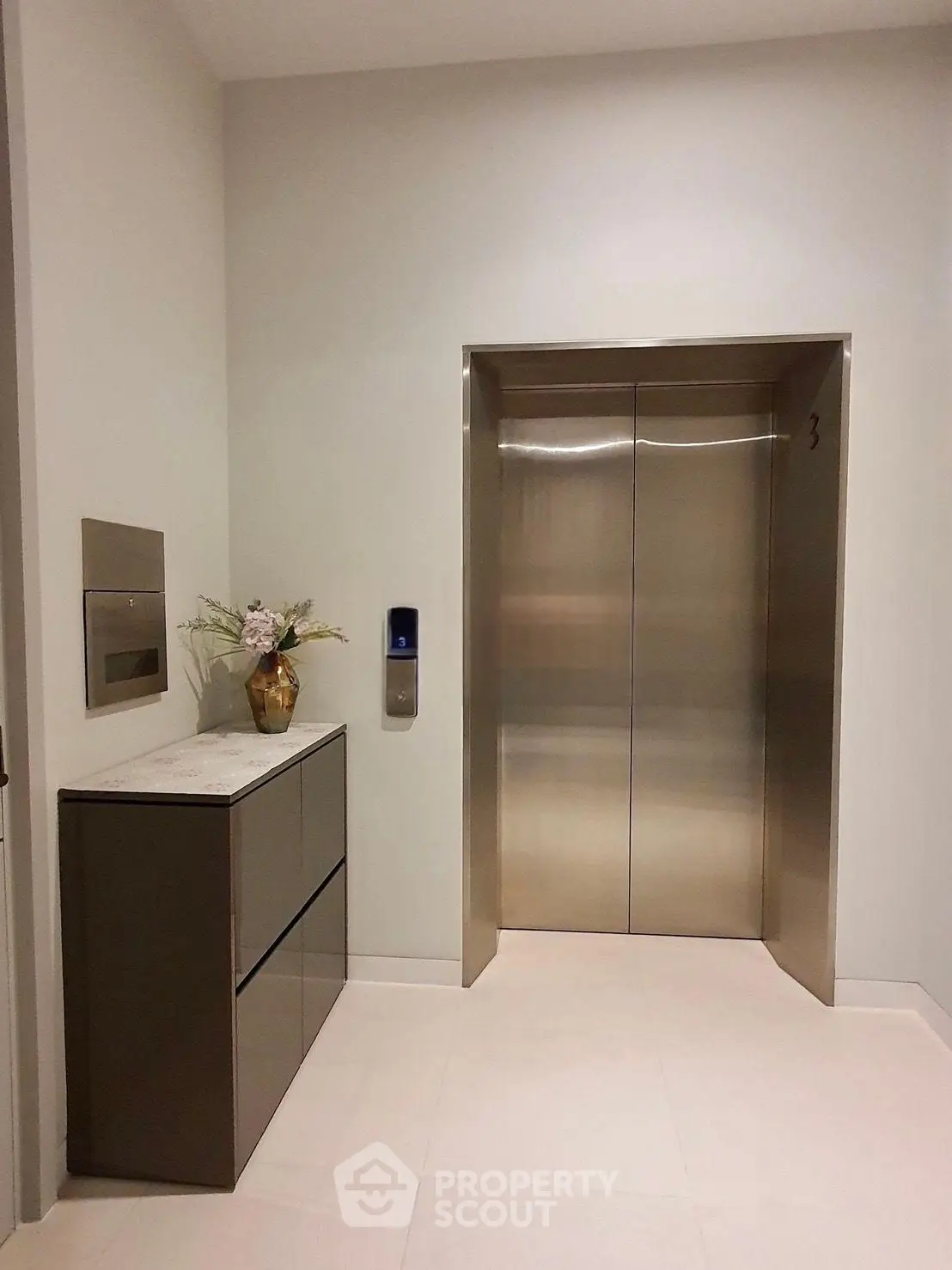 Modern building elevator lobby with sleek design and elegant decor