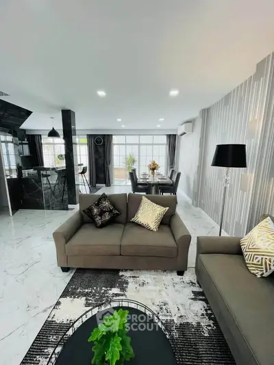 Luxurious modern living room with elegant decor and open layout