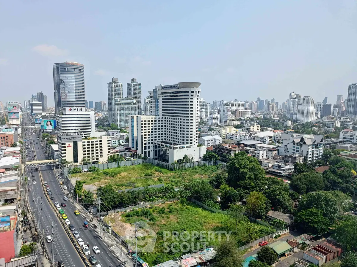Stunning cityscape view showcasing modern skyscrapers and lush greenery in urban landscape.